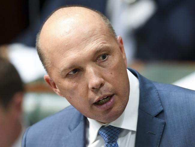 Australian Home Affairs Minister Peter Dutton speaks during House of Representatives Question Time at Parliament House in Canberra, Wednesday, March 28, 2018. (AAP Image/Lukas Coch) NO ARCHIVING