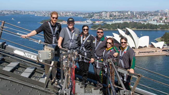 Invictus Games reps with Prince Harry and the PM. Picture: AFP