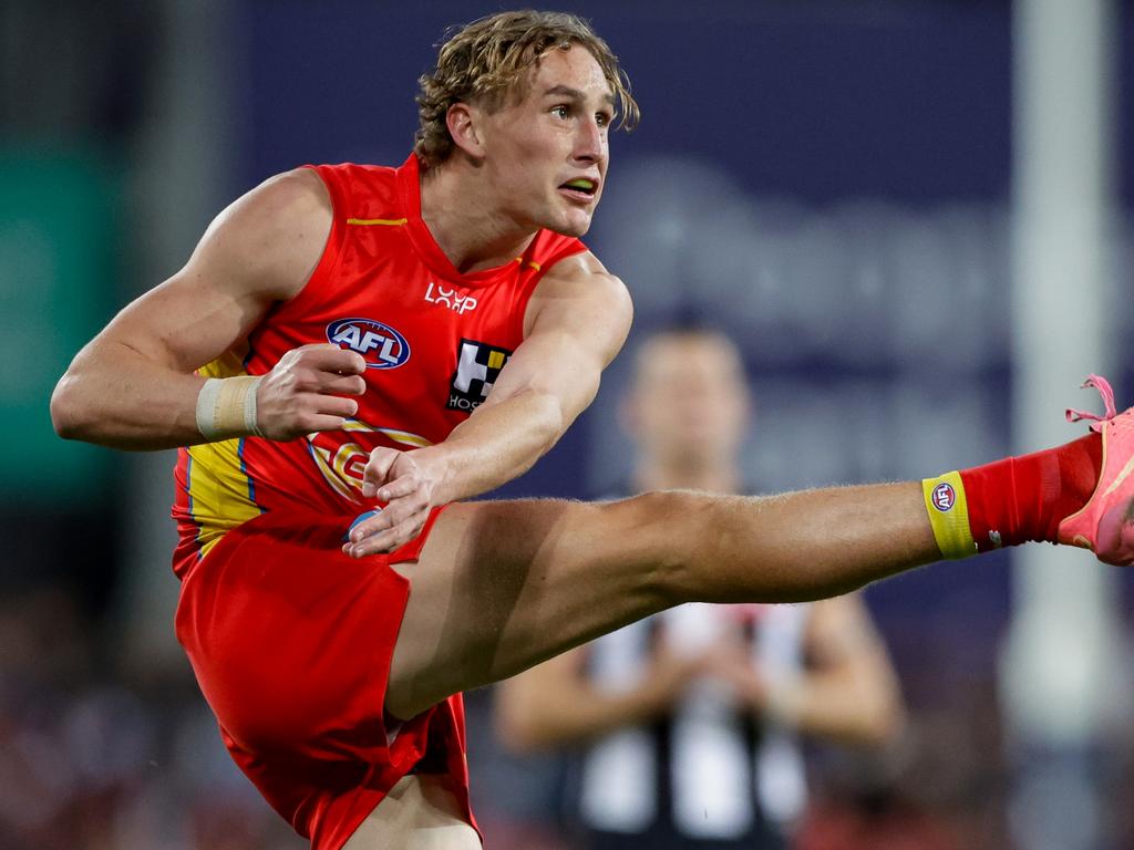 Sam Clohesy launches long for the Suns. Picture: Russell Freeman/AFL Photos via Getty Images