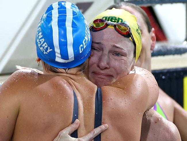 BRISBANE, AUSTRALIA - JUNE 15: Cate Campbell of Queensland is hugged by Meg Harris of Queensland after competing in the WomenÃ¢â¬â¢s 50m Freestyle Final during the 2024 Australian Swimming Trials at Brisbane Aquatic Centre on June 15, 2024 in Brisbane, Australia. (Photo by Quinn Rooney/Getty Images)