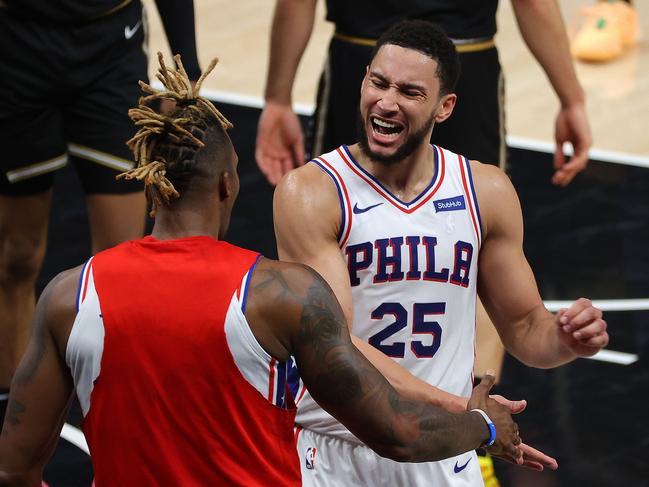 Ben Simmons with Dwight Howard.