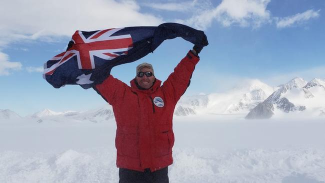 Flying the flag for Australia, as well as Spinal Injury Australia, while in Antarctica. 