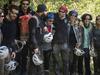 Members of the French team that participated in the "Deep Time" study pose for a photo after exiting the Lombrives Cave in Ussat les Bains, France, Saturday, April 24, 2021. After 40 days in voluntary isolation, 15 people participating in a scientific experiment have emerged from a vast cave in southwestern France. Eight men and seven women lived in the dark, damp depths of the Lombrives cave in the Pyrenees to help researchers understand how people adapt to drastic changes in living conditions and environments. They had no clocks, no sunlight and no contact with the world above. (AP Photo/Renata Brito)