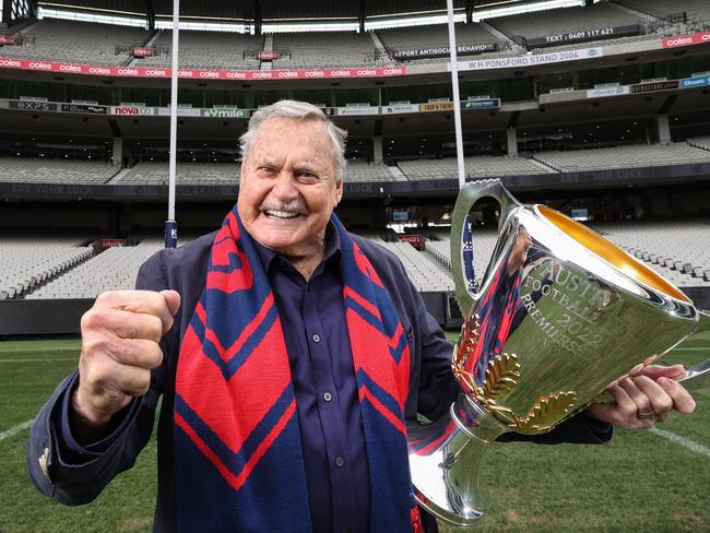 Finals are back the MCG. Football legend Ron Barassi is looking forward for his beloved Melbourne Demons to take home the 2022 Premiership Cup. Ron holds the 2022 AFL Premiership Cup on the MCG.               Picture: David Caird