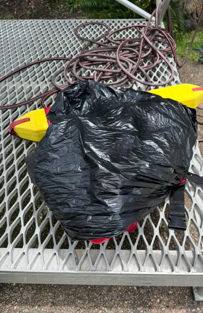 Medical kits stored inside ripped plastic bags with rescue tubes tied up incorrectly according to Mr Ayles. Photo: David Ayles