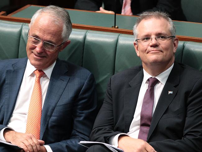 CANBERRA, AUSTRALIA - MAY 05:  Prime Minister Malcolm Turnbull and Treasurer Scott Morrison listen to Opposition leader Bill Shorten deliver his budget reply speech on May 5, 2016 in Canberra, Australia. The Turnbull Government's first budget has delivered tax cuts for small and medium businesses, income tax cuts people earning over $80,000 a year,new measures to help young Australians into jobs and cutbacks to superannuation concessions for the wealthy.  (Photo by Stefan Postles/Getty Images)
