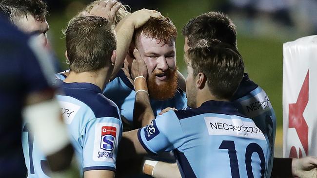 Harry Johnson-Holmes after scoring a try against the Melbourne Rebels last season.