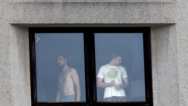 Quarantined guests at the Intercontinental Hotel in Sydney under guard by NSW Police. Picture: Matrix