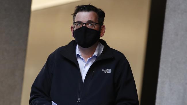 Premier Daniel Andrews arrives to speak to the media during a press conference wearing a The North Face jacket. Picture: NCA NewsWire / Daniel Pockett