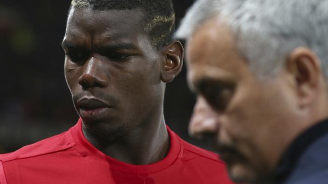 Paul Pogba with Jose Mourinho.