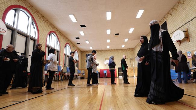 Voters wait in line to vote at the Lowrey School in Dearborn, Michigan, on November 5. Trump won Dearborn, the nation’s largest Arab-majority city.