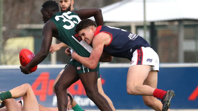 EDFL: Airport West’s Reuben William is tackled by Michael Dalrymple of Tullamarine. Picture: Hamish Blair