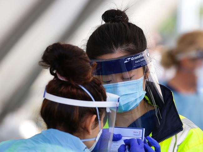 SYDNEY, AUSTRALIA - Newswire Photos AUGUST 10, 2021: Members of the public are seen lining up in their cars to have the Covid-19 test at the  Bondi Beach drive through testing clinic while Sydney remains in an ongoing Covid-19 Lockdown. Picture: NCA Newswire /Gaye Gerard