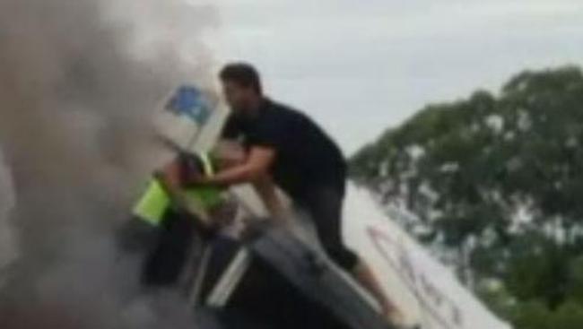 Athen Barnaby rescues Dave from the burning truck on the M1.