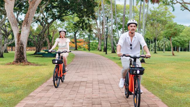 Veruschka Warde and Robbie Turnbull enjoy the Darwin eBikes, set to be launched next month. Picture: Supplied