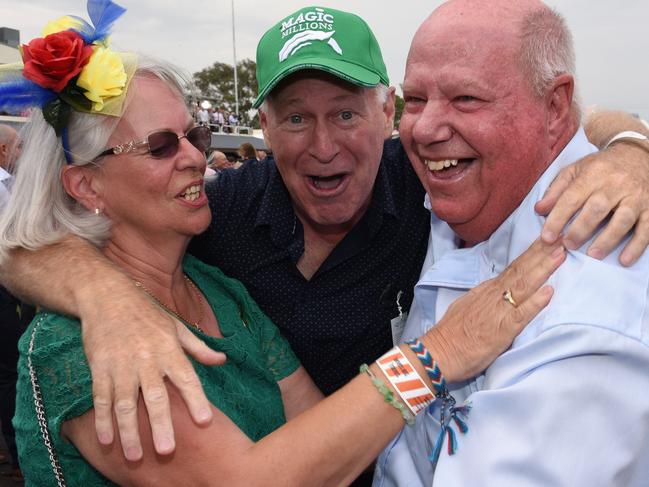 Alligator Blood owners Allan Endresz (centre), Robyn and Jeff Simpson celebrate after their star was successful on the Magic Millions Raceday.