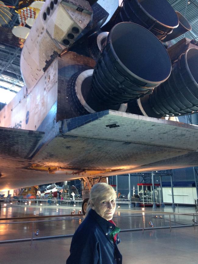 Jerrie poses under the Space Shuttle at the Udvar Hazy aviation exhibit, 2014. Picture: Mary Haverstick.