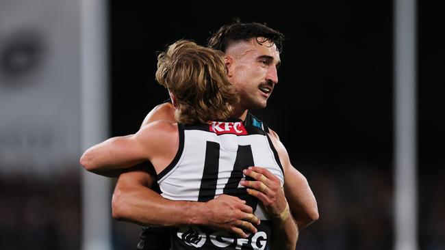 ADELAIDE, AUSTRALIA - APRIL 13: Miles Bergman and Ivan Soldo of the Power celebrate a goal during the 2024 AFL Round 05 match between the Port Adelaide Power and the Fremantle Dockers at Adelaide Oval on April 13, 2024 in Adelaide, Australia. (Photo by James Elsby/AFL Photos via Getty Images)