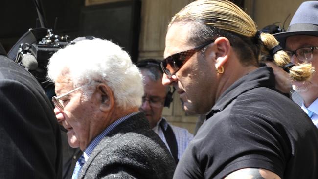 Paolo Amenta with son John outside the coroners court.