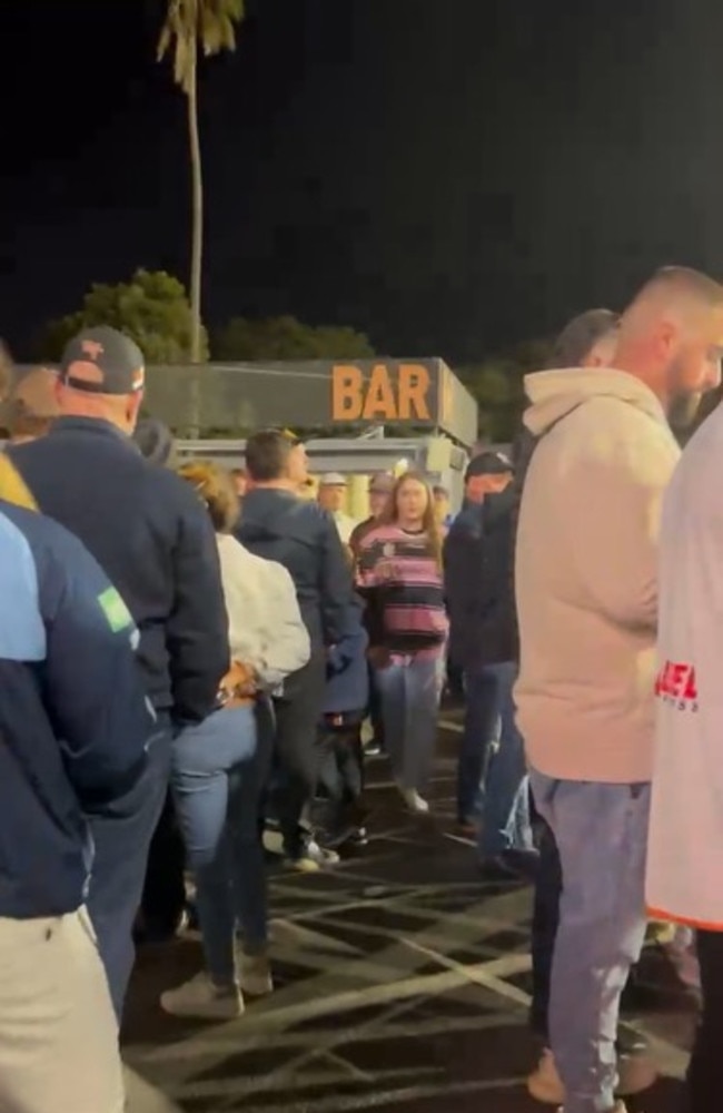 Long bar queues at Leichhardt Oval following a systems breakdown.