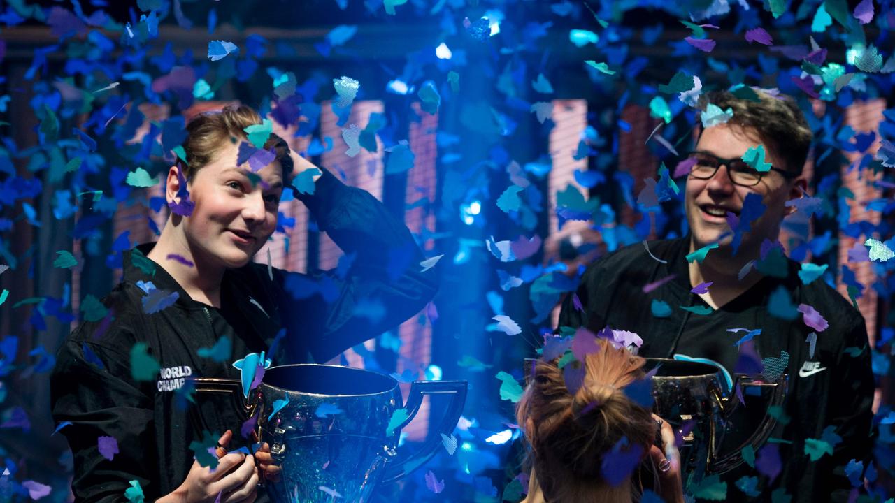 Emil "Nyhrox" Bergquist Pedersen (L) and Thomas "Aqua" Arnould pose with their trophies after winning the Duos competition. Picture: AFP