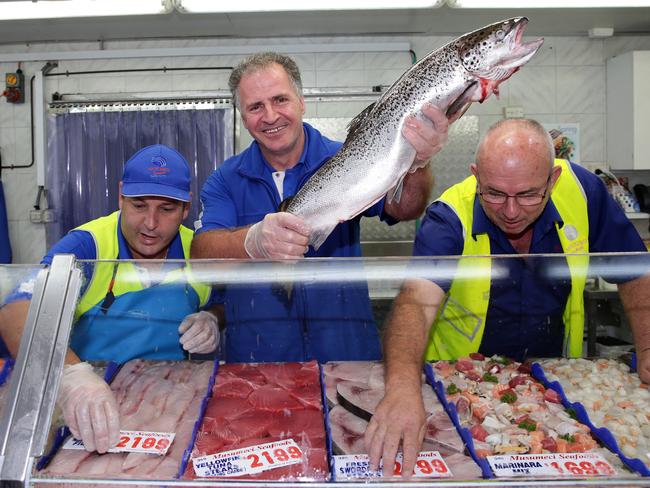 Musumeci Seafoods part owner Con Doukas with staff Frank Chrisafis and John Mertzanakis preparing for the Easter rush. Picture: Craig Wilson