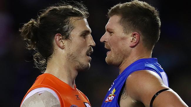 Jack Redpath was hit hard by the AFL Tribunal after a run-in with Giant Phil Davis. Pic: Michael Klein