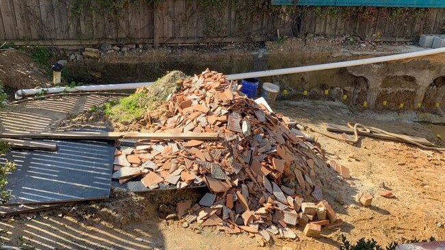 The pile of rubbish left on their property.