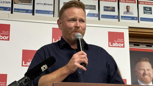 Labor by-election winner Alex Dighton arrives at his victory party at the Cobra Football Club with his family and Premier Peter Malinauskas. Dighton won the by-election over the Liberal candidate Amanda Wilson. Picture: Supplied