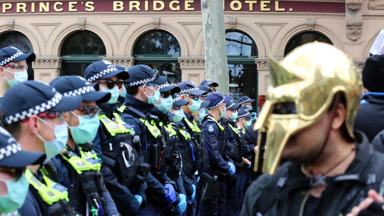 Police face lockdown protesters in Melbourne on July 24 protest.