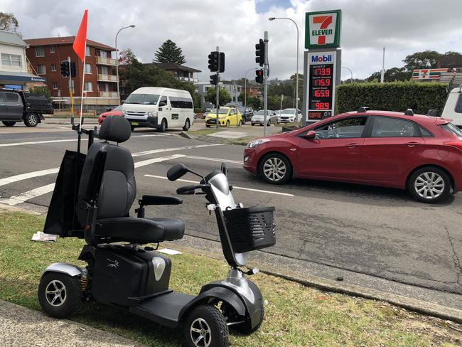 A CareFlight helicopter and multiple ambulances were called to the scene of an accident at Pittwater Rd, Dee Why, after a man's mobility scooter toppled into a stationary car at a busy intersection. Picture: Jim O'Rourke.