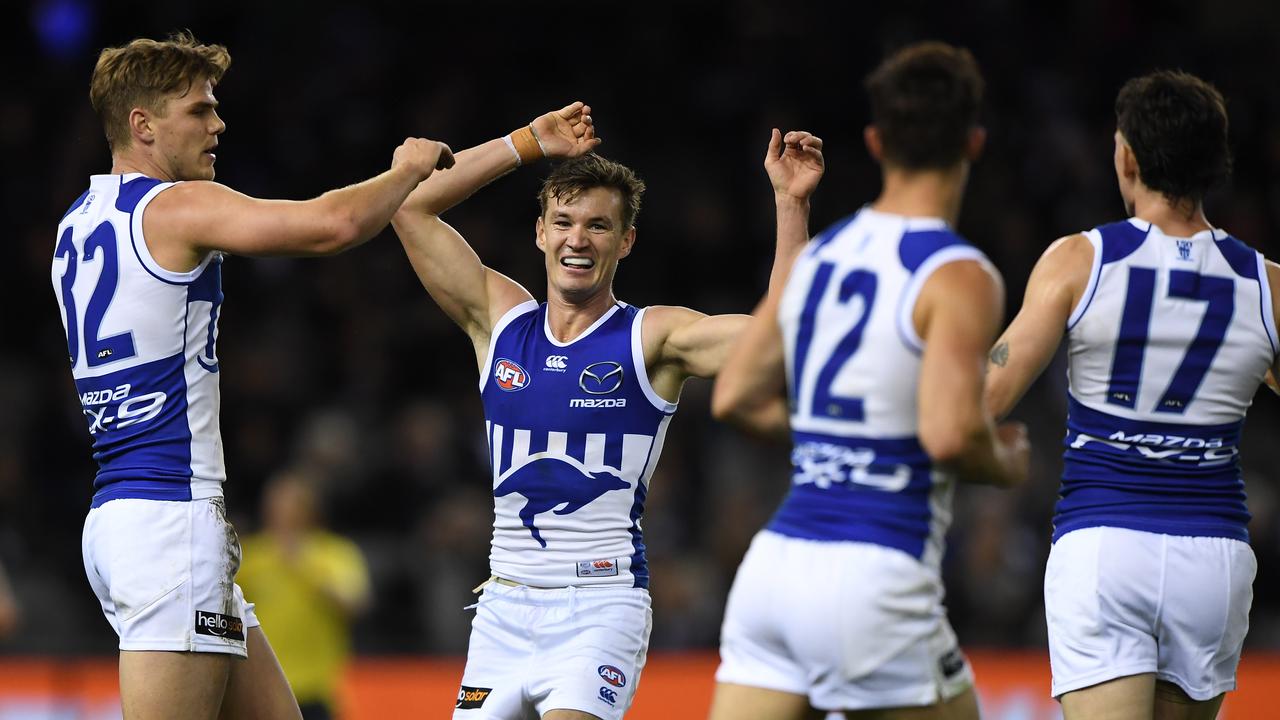 Kayne Turner celebrates a goal against Collingwood at Marvel Stadium.