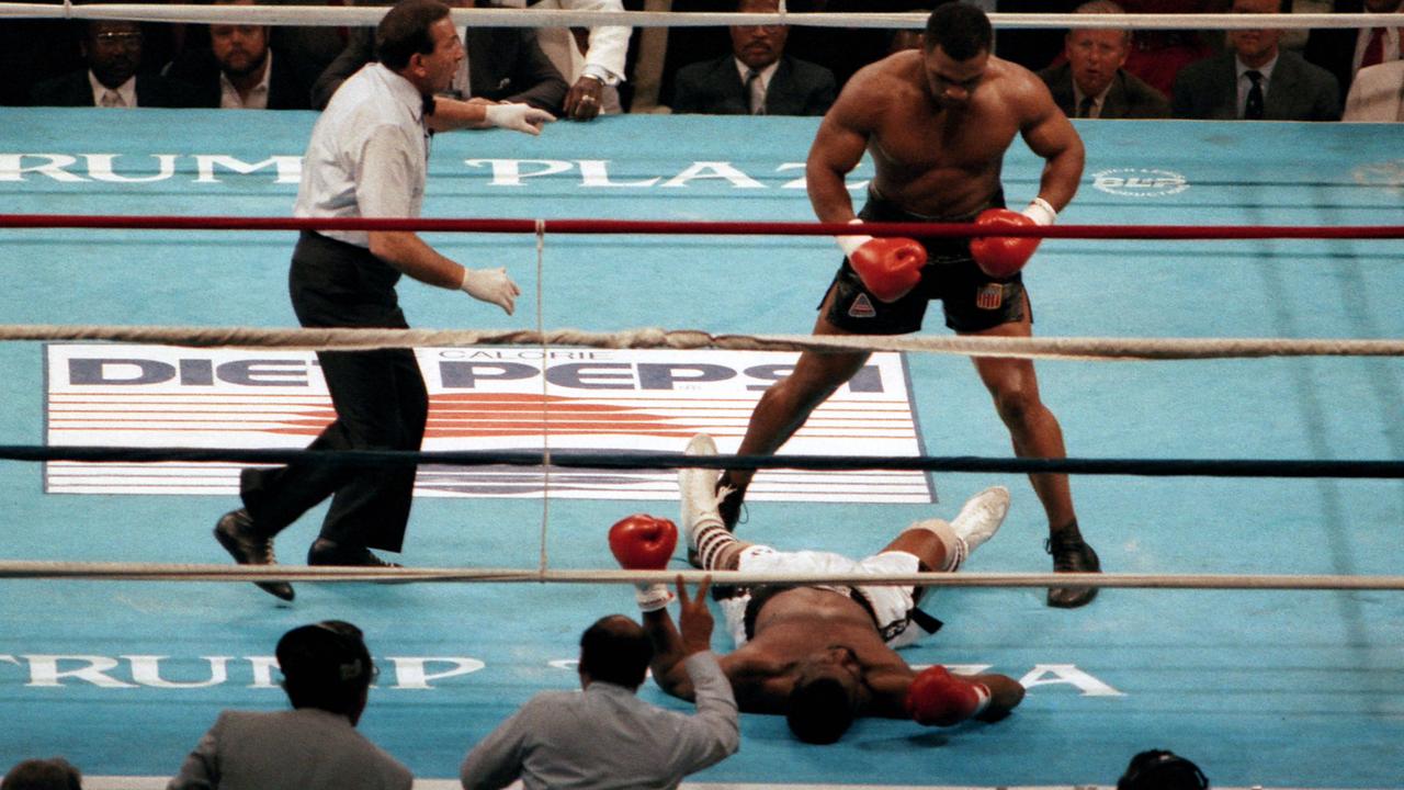 Mike Tyson v Roy Jones Jnr Mike Tysons greatest knockouts; Larry Holmes, Michael Spinks, Trevor Berbick all felt power of Baddest Man of the Planet