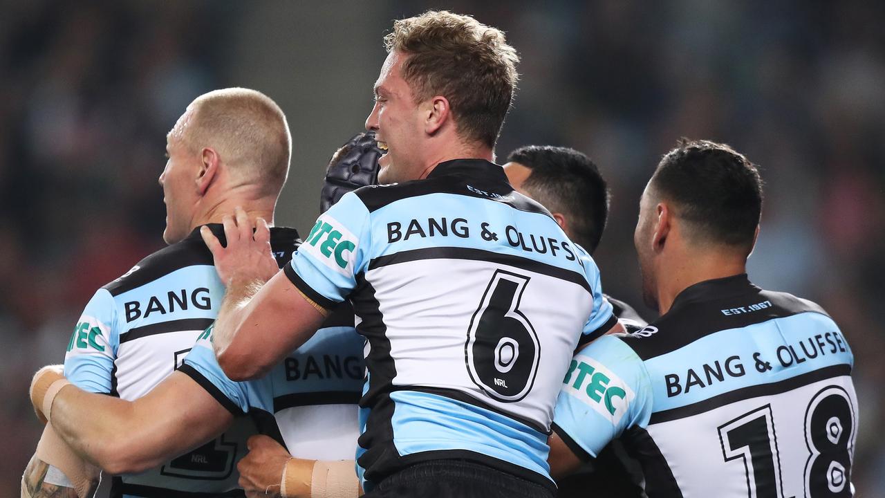 Cronulla's Matt Moylan celebrates a try by Cronulla's Chad Townsend.