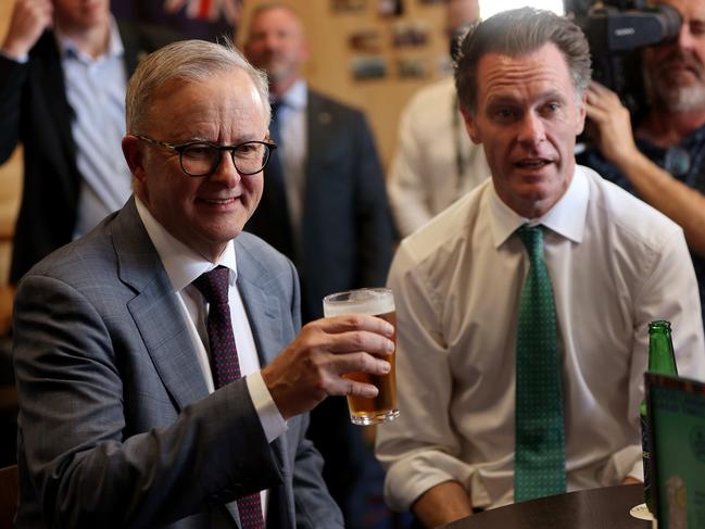 SYDNEY, AUSTRALIA - NewsWire Photos MARCH 17, 2023: Anthony Albanese Prime Minister of Australia and Chris Minns leader of NSW Labour have a beer at the Unity in Balmian. and Picture: NCA NewsWire / Damian Shaw