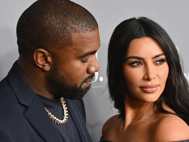 (FILES) In this file photo US media personality Kim Kardashian West (R) and husband US rapper Kanye West attend the WSJ Magazine 2019 Innovator Awards at MOMA on November 6, 2019 in New York City. - Reality TV star Kim Kardashian has filed for divorce from rapper Kanye West after almost seven years of marriage, US media reported February 19.   Kardashian's lawyer Laura Wasser filed papers confirming a split first rumored back in January, when the mega-celebrity couple were reported to be living separately, Fox News said. (Photo by Angela Weiss / AFP)