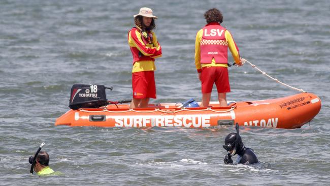 Police divers and surf rescue teams searching for the woman. Picture: David Geraghty