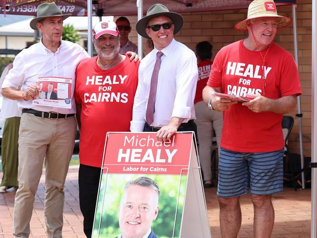 Member for Cairns Michael Healy campaigns with Queensland Premier Steven Miles  in front of the pre polling booths set up at the Cairns Showground. Pics Adam Head