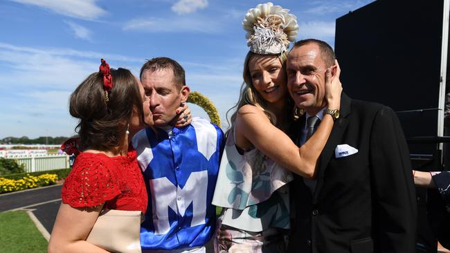 The Winx connection: Hugh Bowman and Chris Waller with their wives.