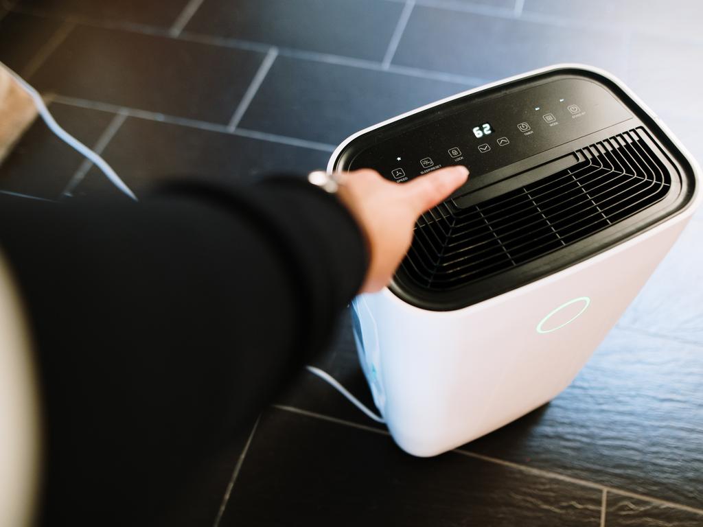 Expert lists a large water tank, air filter and humidistat as the three things you need in a dehumidifier. Picture: iStock.