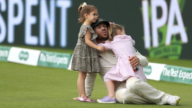 Australia's David Warner celebrates with his children at Edgbaston in Birmingham.