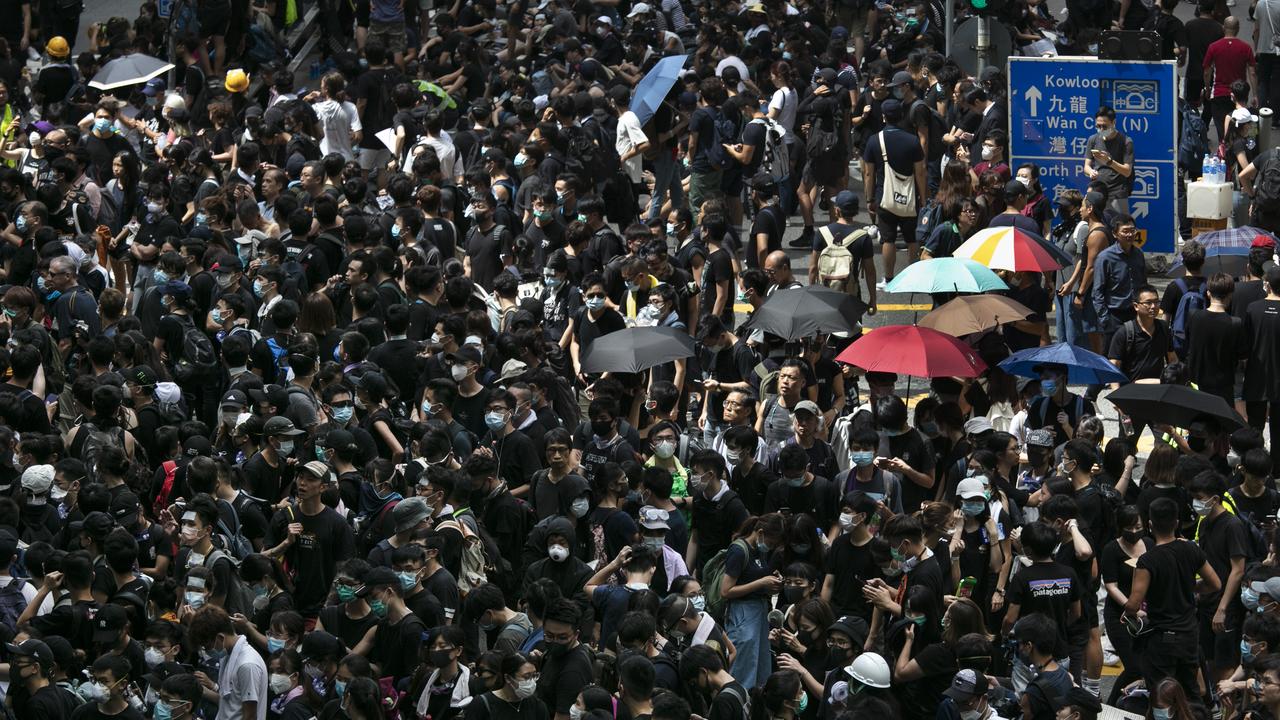 Hong Kong Protesters Thousands Block Police Headquarters And Streets Au — Australia