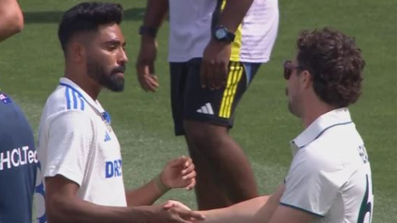 Siraj and Head shake hands after the Adelaide Test.