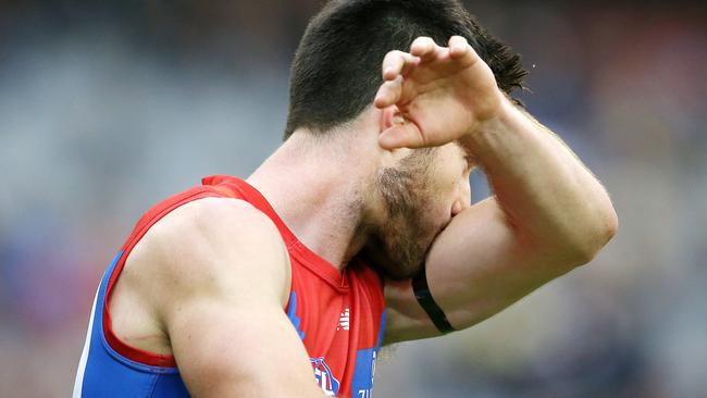 Neal-Bullen kisses his black armband which was a tribute to his grandfather Ian who passed away in May. Picture: Michael Klein.