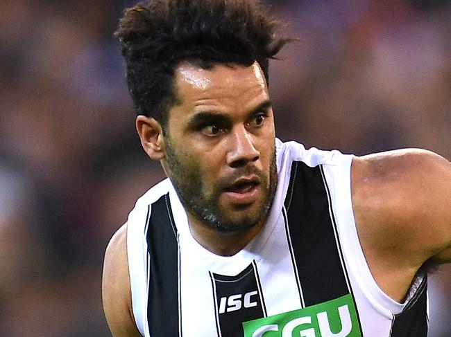 Daniel Wells of the Magpies is seen in action during the Round 12 AFL match between the Melbourne Demons and the Collingwood Magpies at the MCG in Melbourne, Monday, June 11, 2018. (AAP Image/Julian Smith) NO ARCHIVING, EDITORIAL USE ONLY