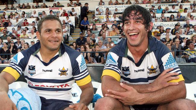 NRL - North Queensland Cowboys vs New Zealand Warriors @ Dairy Farmers stadium -Johnathan Thurston (R) takes a rest on the bench beside Matt Bowen (L) near the end of the game