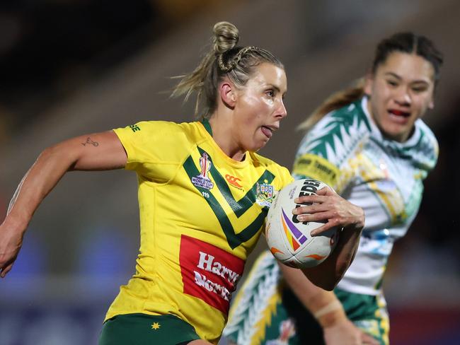 YORK, ENGLAND - NOVEMBER 02: Samantha Bremner of Australia  runs in to score their team's fourth try during the Women's Rugby League World Cup 2021 Pool B match between Australia Women and Cook Islands Women at LNER Community Stadium on November 02, 2022 in York, England. (Photo by George Wood/Getty Images)