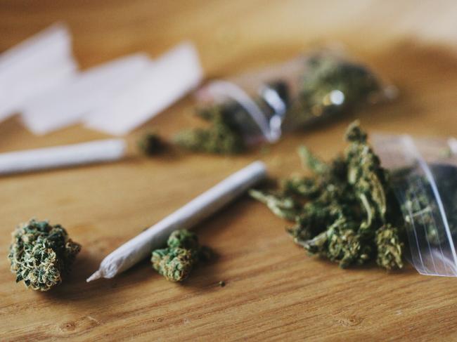 Shot of dried marijuana and a rolled joint. Cannabis clipseal bag generic image. Picture: iStock