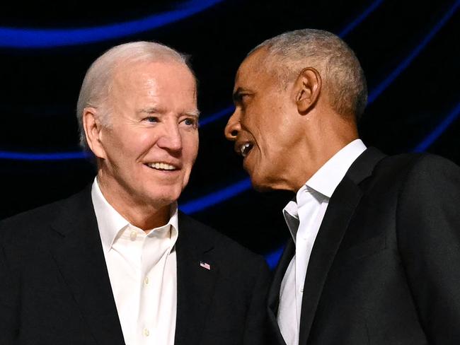 (FILES) US President Joe Biden (L) and former US President Barack Obama attend a campaign fundraiser at the Peacock Theater in Los Angeles on June 15, 2024. Former US president Barack Obama has told allies that Joe Biden needs to reconsider his reelection bid, the Washington Post reported on July 18, 2024. Obama believes that Biden's path to victory has diminished and that the 81-year-old should "seriously consider the viability of his candidacy," the newspaper said, citing people briefed on his thinking. (Photo by Mandel NGAN / AFP)