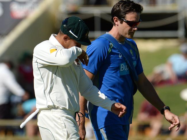 Usman Khawaja walks off after injuring his hamstring against New Zealand in a Test match last summer. Picture: Daniel Wilkins